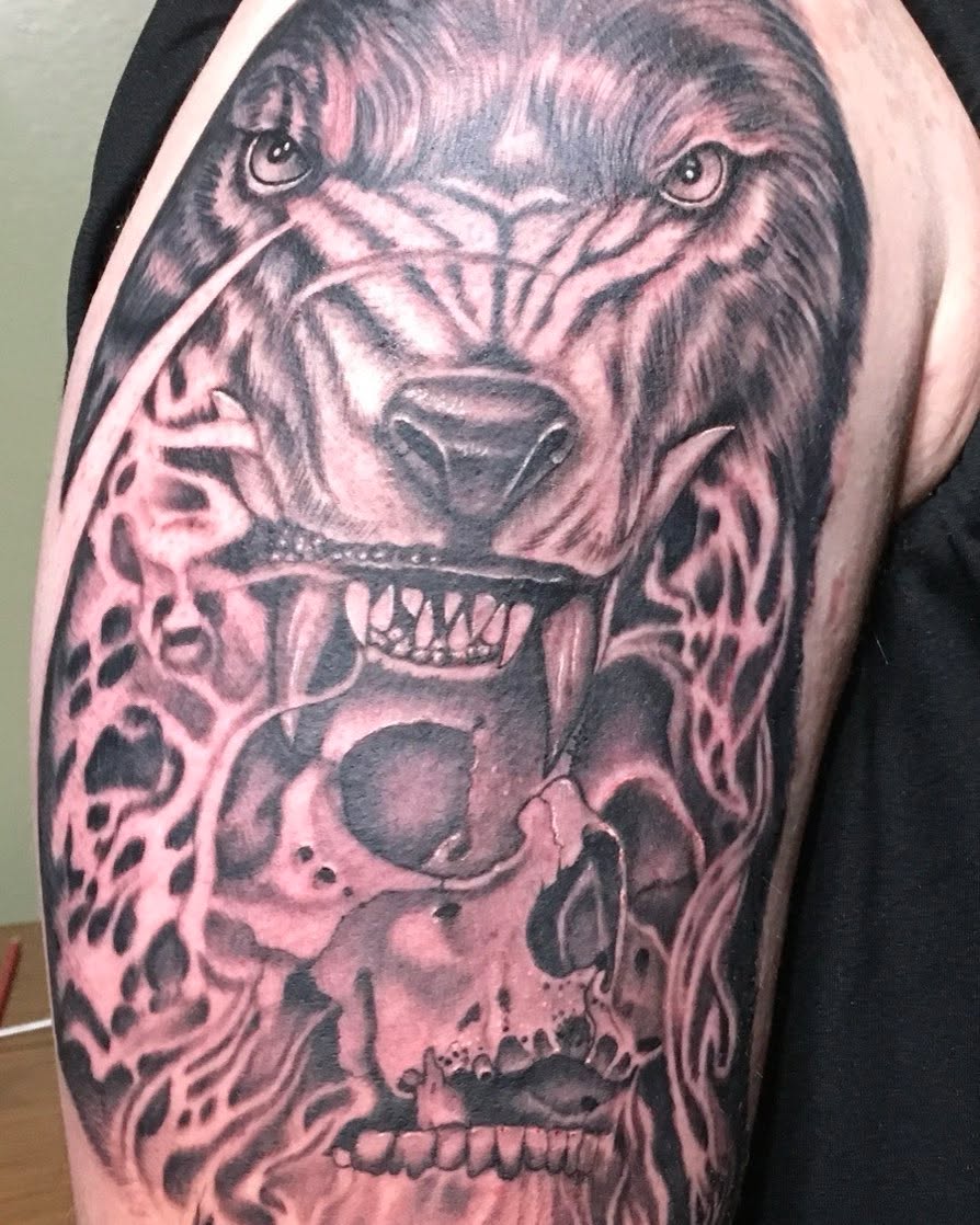 Black and grey tiger and skull tattoo